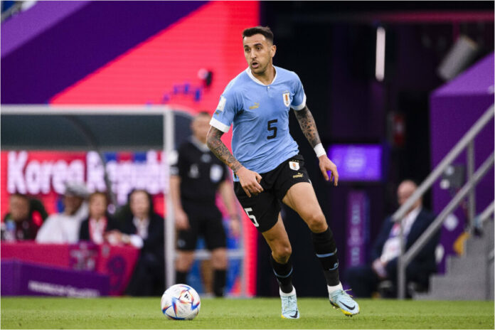 Vecino em campo com a camisa do Uruguai
